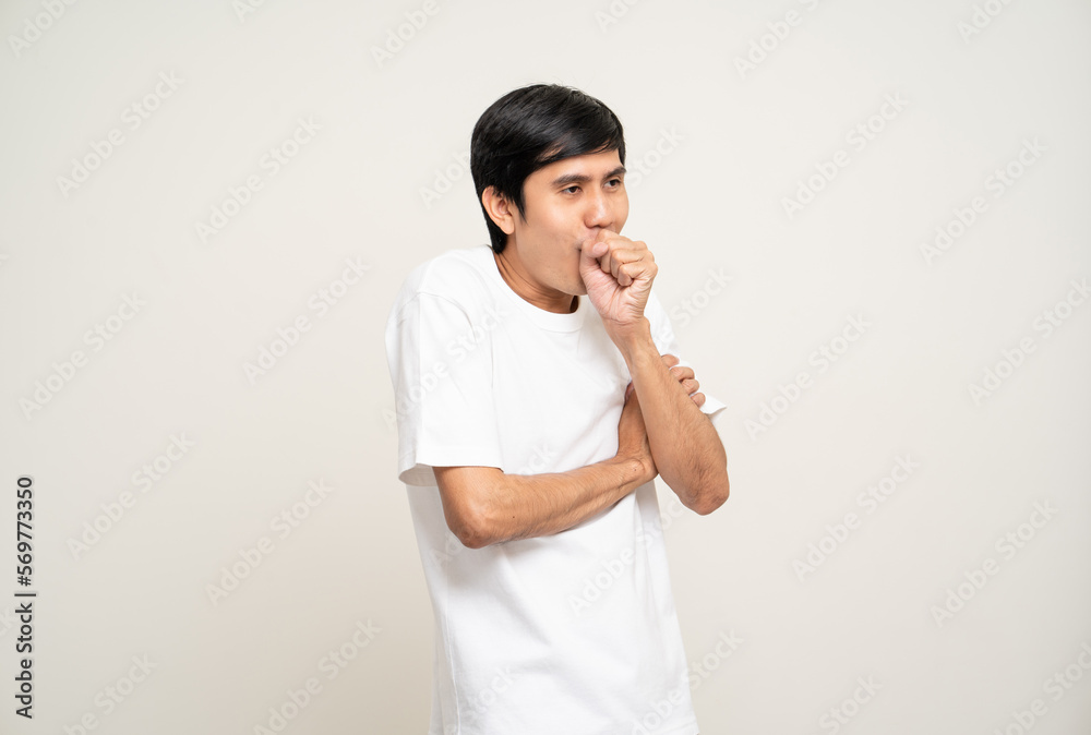 Man have throat irritation, mucus and coughing. Fever headache respiratory tract infection. Young male unhealthy Sickness need to consult a doctor and get treatment. On isolated white background. Man have throat irritation, mucus and coughing. Fever headache respiratory tract infection. Young male unhealthy Sickness need to consult a doctor and get treatment. On isolated white background.