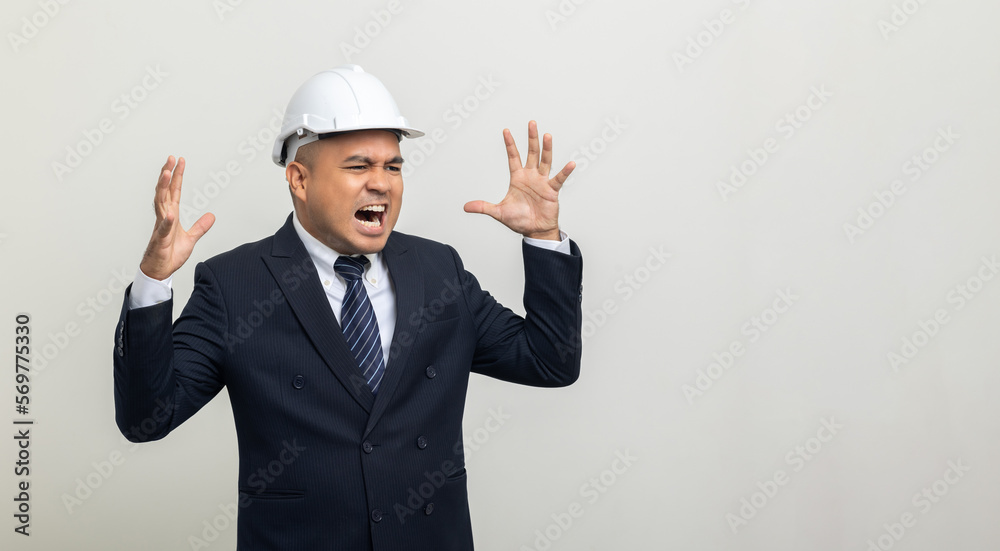 Depressed stressed Engineer. Young asian businessman on isolated white background. Angry middle aged Indian businessman in office uniform. Depressed stressed Engineer. Young asian businessman on isolated white background. Angry middle aged Indian businessman in office uniform.
