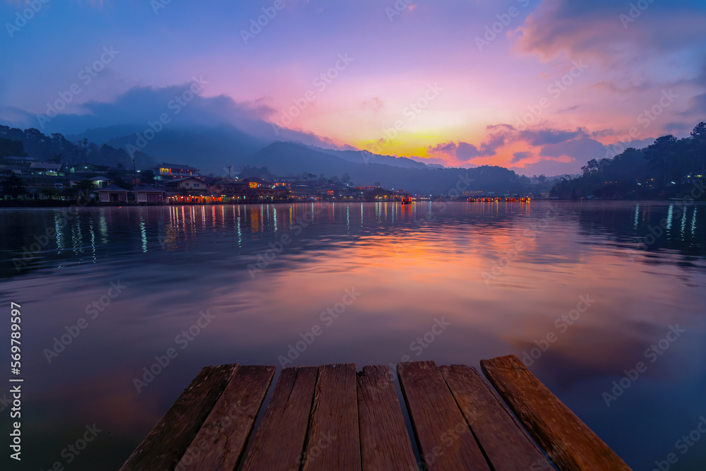 View of Lake and mist morning at Ban Rak Thai villag, a Village of Chinese settlement is travel destination in Mae Hong Son province, Amazing northern Thailand, Long exposure.