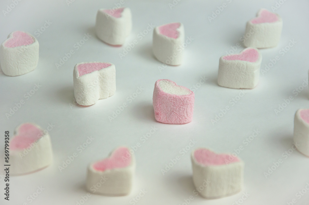 marshmallow on a light background in the form of hearts marshmallow on a light background in the form of hearts
