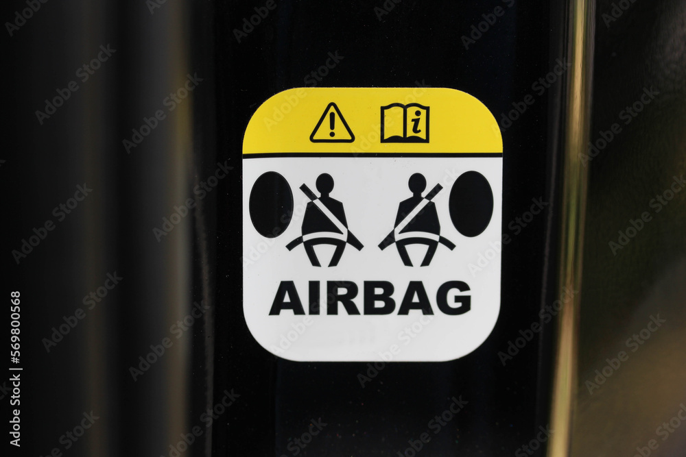 Airbag warning label in a new vehicle  - obrazy, fototapety, plakaty 