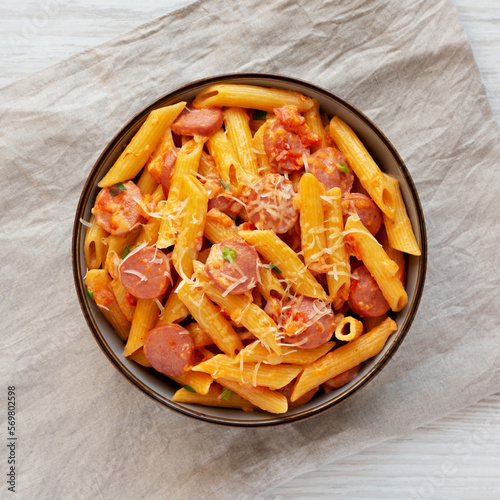 Homemade One-pot Hot Dog Pasta in a Bowl, top view. Flat lay, overhead, from above.