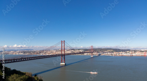 Landscape of the April 25 bridge over the Tagus river near Lisbon city - Portugal