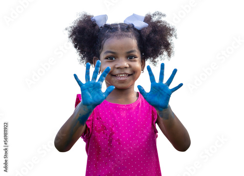 Foto Cheerful little child girl showing painted hand, Cute little kid girl playing ou