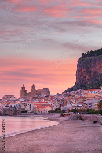 Cefalu, Sicily, Italy. Cityscape image if coastal town Cefalu in Sicily at dramatic sunrise.