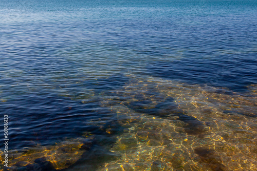 Background image - sea water with soft waves and reefs
