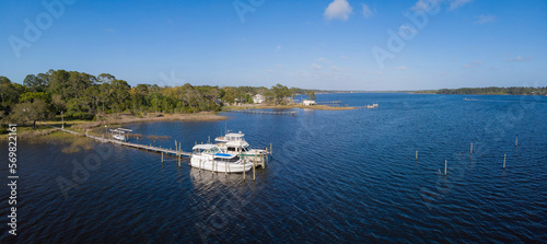 Canvas Print Boats on private docks on waterfront at Navarre, Florida