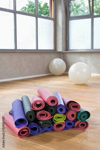 Pile of colorful Yoga mats in Yoga Studio photo