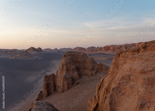 Serene sunset over the amazing Dasht-e Lut Desert and its rock formations (Kaluts) at sunset, Kerman Province, Iran