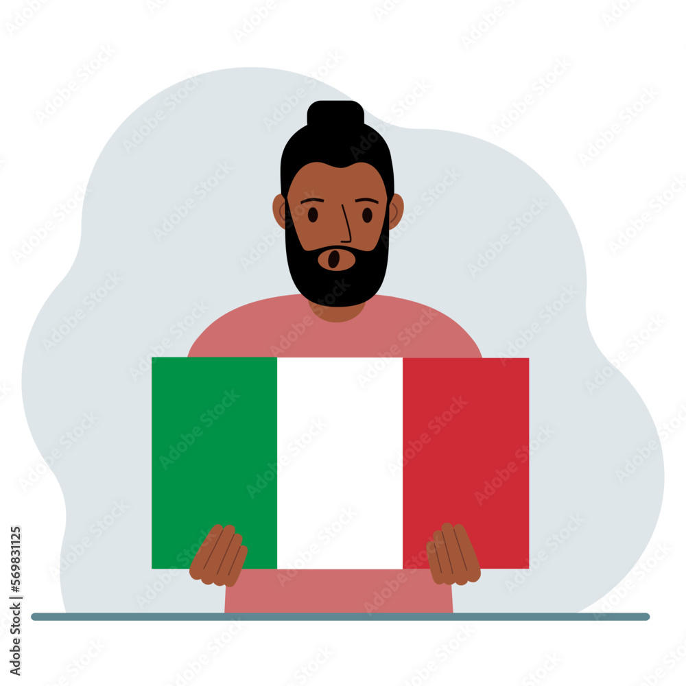 A man holds an Italian flag in his hands. The concept of demonstration, national holiday or patriotism.