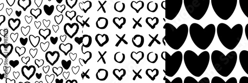 Set heart romantic doodle seamless patterns with black hearts, tic tac toe elements. Shape on white background in hand drawn hipster grunge style.