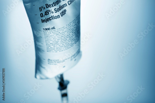 saline bag on light blue background