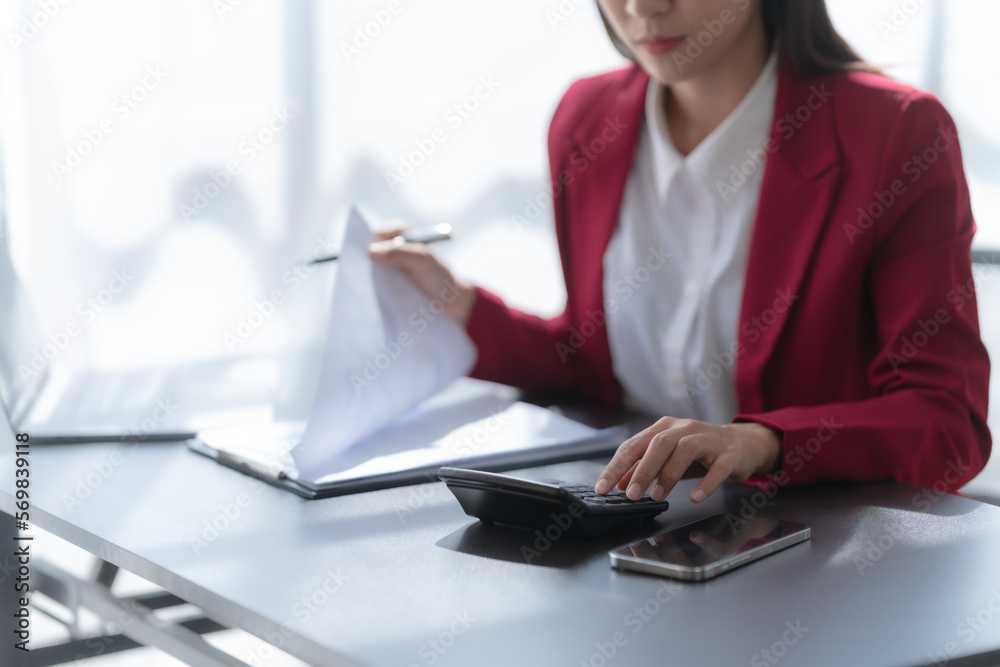 Young pretty attractive asia chinese half thai woman mixed race working with online balance sheet outsource, online bookkeepers helpful consult customized accounting reports and financial statements. Young pretty attractive asia chinese half thai woman mixed race working with online balance sheet outsource, online bookkeepers helpful consult customized accounting reports and financial statements.