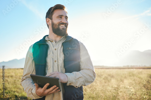 Research or agriculture man on tablet on farm for sustainability, production or industry growth analysis. Agro, happy or farmer on countryside field for weather, checklist or data search in Texas photo