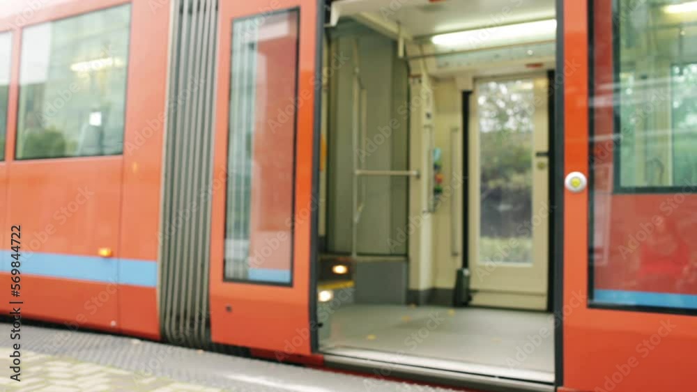 Wide shot man carrying bike off street car