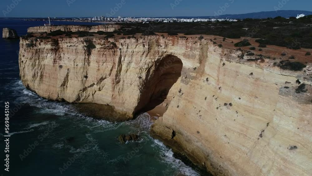 Portimao Cliffs and coast line from aerial view at sunrise Portimao Cliffs and coast line from aerial view at sunrise