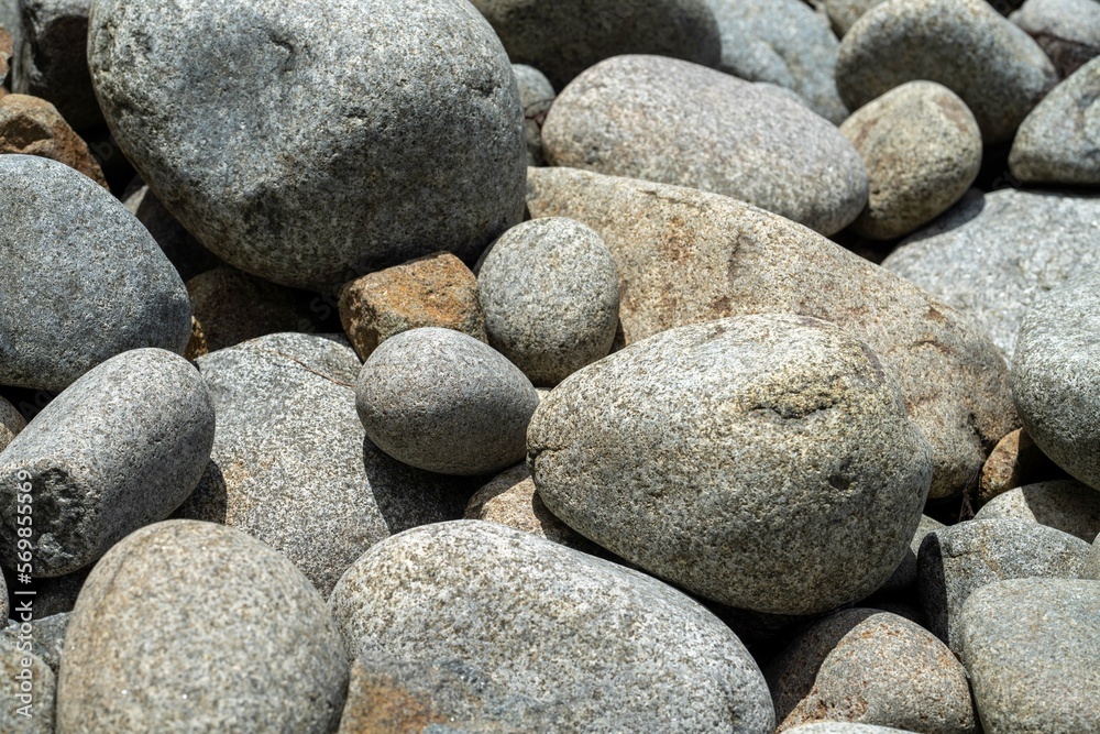 round rocks and pebbles on the beach in australia round rocks and pebbles on the beach in australia