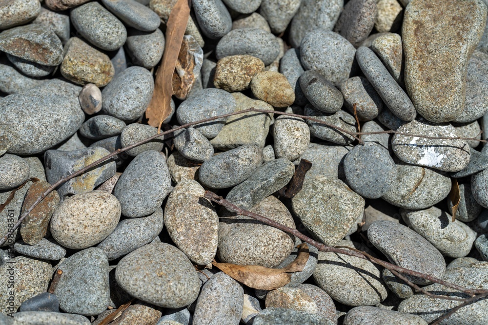 round rocks and pebbles on the beach in australia round rocks and pebbles on the beach in australia