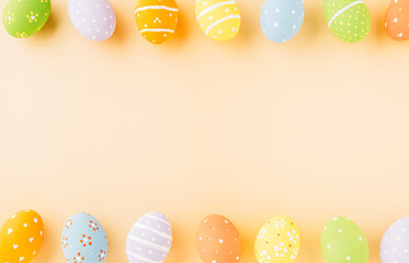 Overhead easter eggs isolated on pastel background with copy space, Funny decoration, Happy Easter Day greeting card, Creative composition banner web design holiday background, flat lay top view