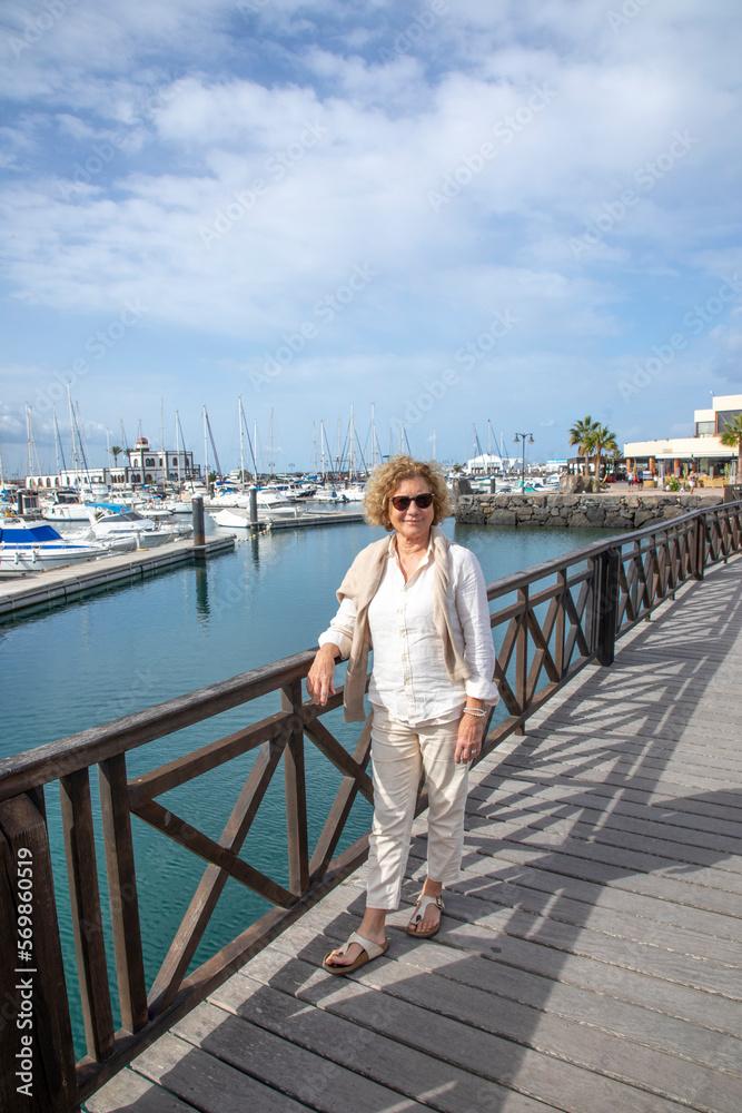 portrait of attractive mature woman in the harbor portrait of attractive mature woman in the harbor