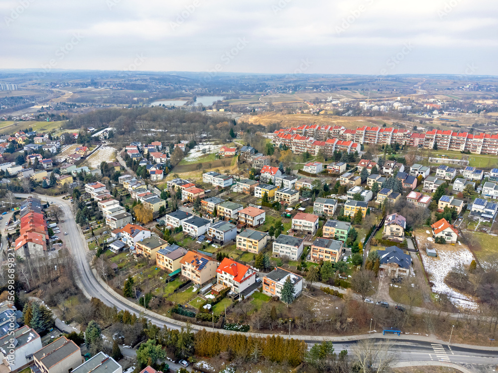 Aerial view landscape. Buildings, houses, bungalow estate, roofs and streets.