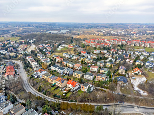 Obraz na płótnie Aerial view landscape. Buildings, houses, bungalow estate, roofs and streets. w salonie
