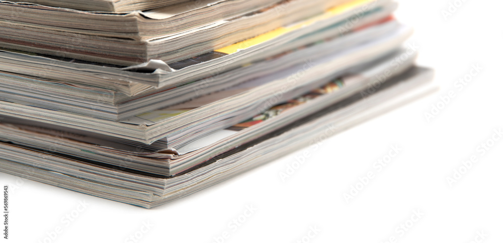 pile of magazines colorful isolated on a white background pile of magazines colorful isolated on a white background