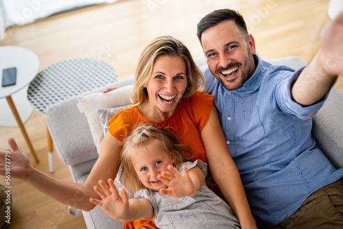 Happy family at home spending time together. People happiness child concept