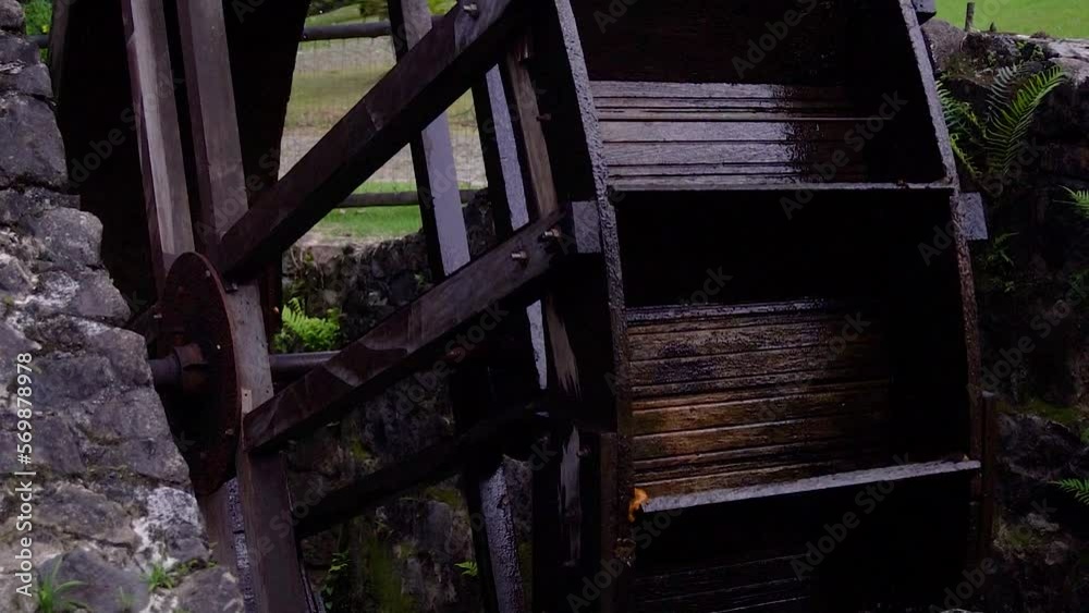 Very old watermill being use to make flour. It is an ancient technique to process foods and create mechanical movement by using natural resources.