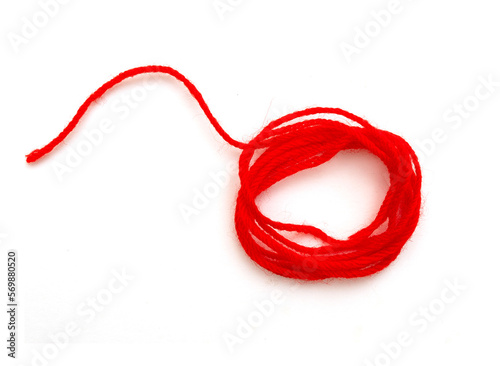 Skein of thin red string or rope isolated on white, top view
