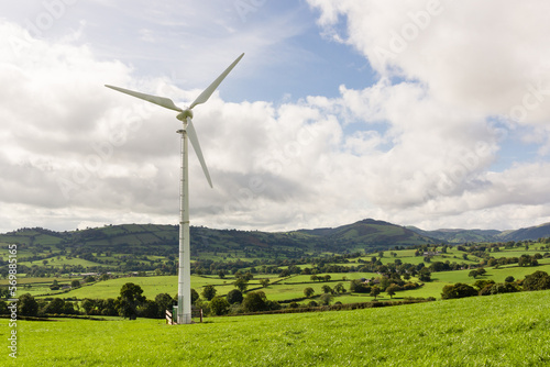 Wind turbine in the rural farming landscape above the Tanat Valley in Powys North Wales