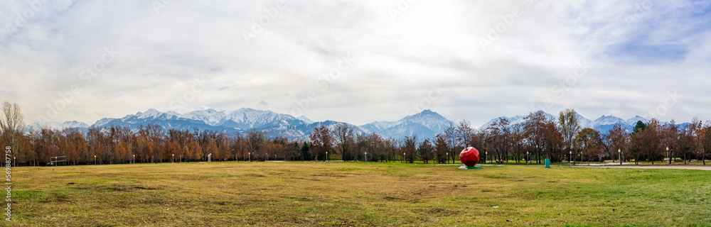 Park in autumn and mountains in the background. Almaty Park in autumn and mountains in the background. Almaty