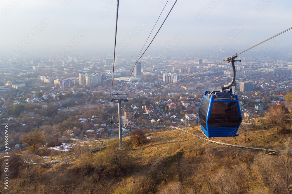 Cableway over the city of Almaty in autumn