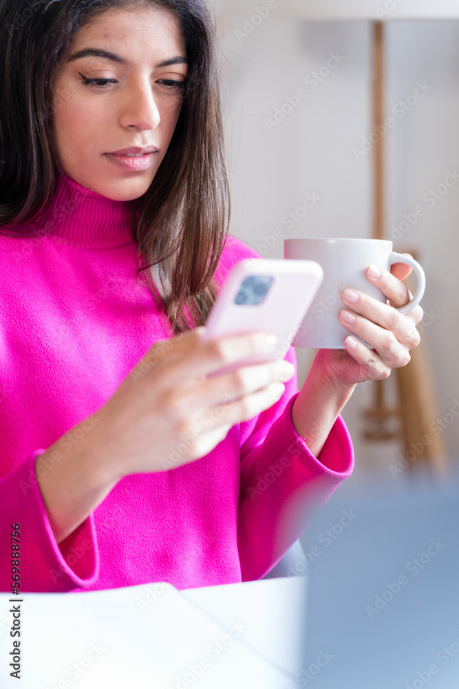 woman using smartphone at home woman using smartphone at home