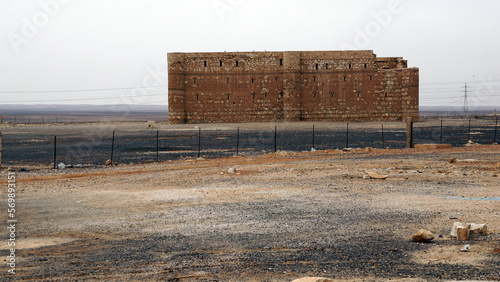 The desert castle Qasr Al-Kharranah in the Eastern Desert in Jordan in the month of January photo