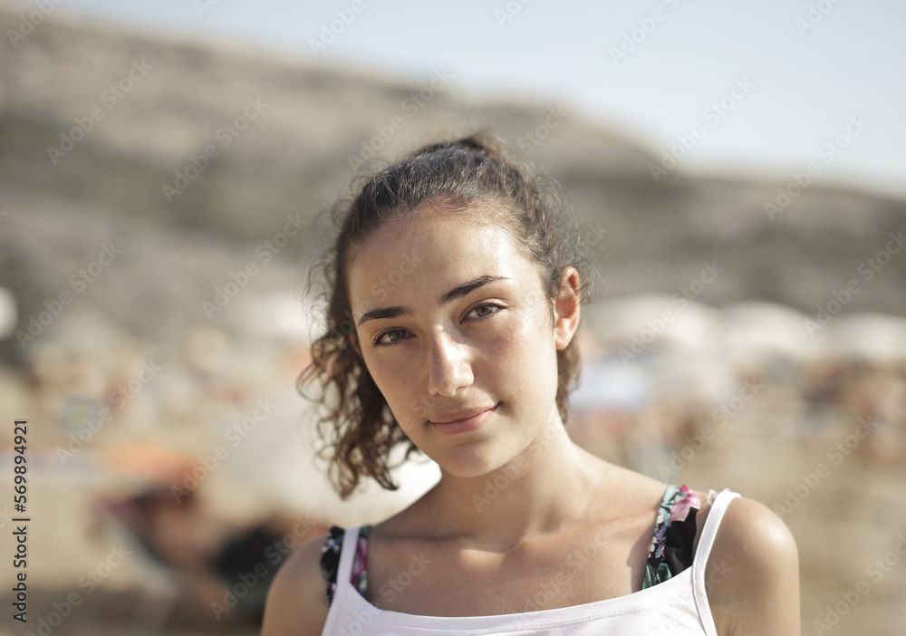 portrait of  a  young woman in the beach