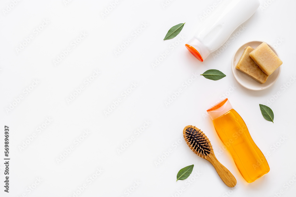 Hair care and styling products with brush, top view Hair care and styling products with brush, top view