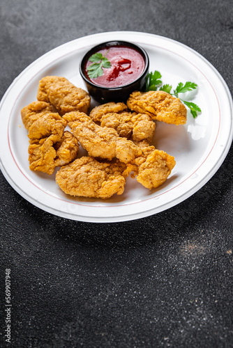 fast food chicken nuggets deep fried poultry meat meal food snack on the table copy space food background rustic top view