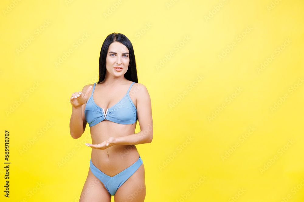 Naklejka premium Woman, body and hands frame stomach for skincare beauty, fitness wellness or model liposuction in studio. Cosmetic tummy tuck, dermatology care and digestion or gut balance with person in underwear