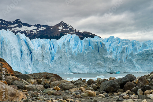 trekking at perito moreno in patagonia, argentina photo