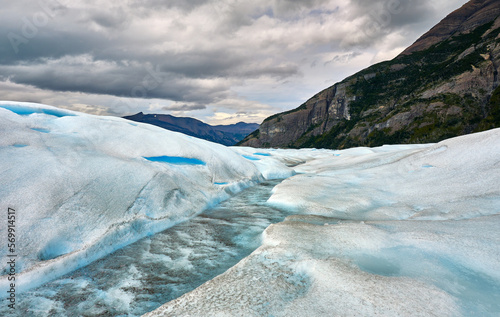 trekking at perito moreno in patagonia, argentina photo