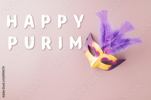 Venetian mask, Carnival mask for Mardi Gras celebration isolated on purple background banner design with copy space, jewish holiday, Purim in Hebrew holiday carnival ball, Happy Purim carnival concept