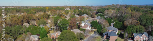 Panorama subdivision urban sprawl row of two-story single-family house in leafy suburbs master planning residential neighborhood in Atlanta, Georgia, USA