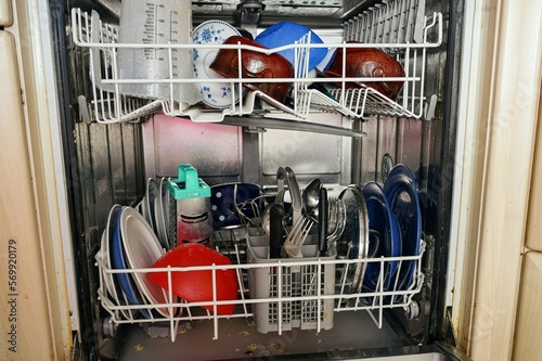 Clean plates, forks, spoons and other utensils after washing in the dishwasher.