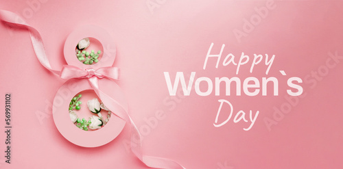 March 8 postcard. Paper number eight decorated with flowers on a pink background