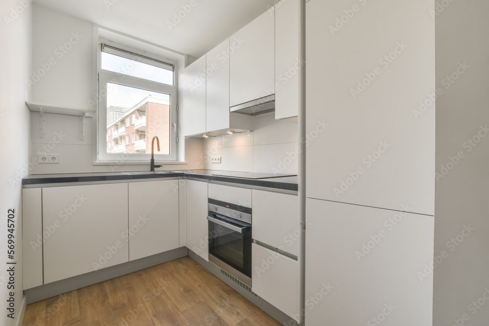 Modern kitchen interior with white cabinets Modern kitchen interior with white cabinets