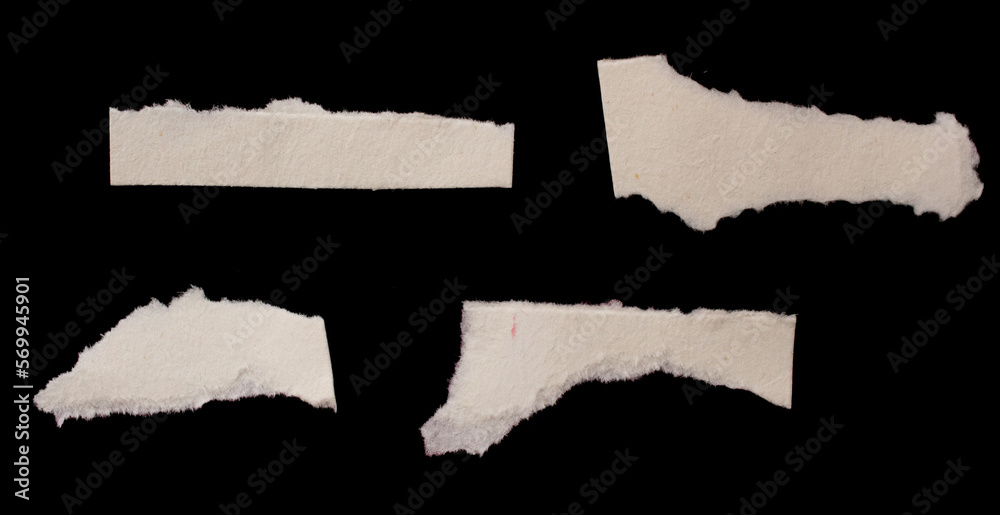 Torn paper piece isolated on black background