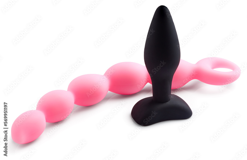 Adult silicon female sex toys for stimulation of body and masturbation isolated on white background Adult silicon female sex toys for stimulation of body and masturbation isolated on white background