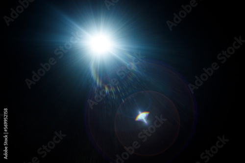 Wallpaper Mural Easy to add lens flare effects for overlay designs or screen blending mode to make high-quality images. Abstract sun burst, digital flare, iridescent glare over black background. Torontodigital.ca