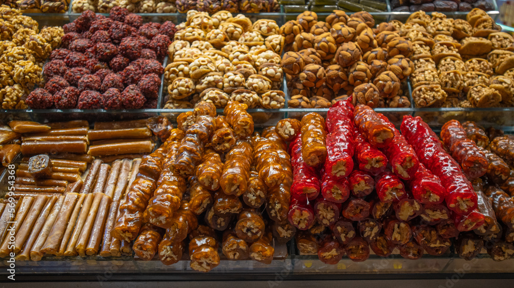 Wide range of sweets at the Grand Bazaar in Istanbul, Turkey. Historic market is popular tourist destination and one of the oldest markets in the world. Turkish sweets at the spice marketplace.